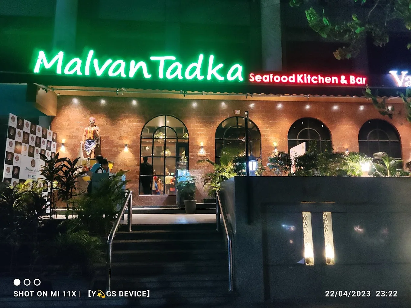 Brick arches lit with green neon